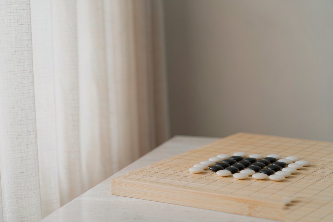 围棋棋盘边角黑白互围｜包围与反包围、博弈